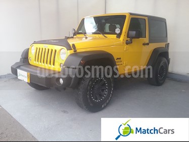 foto Jeep Wrangler 3.6L Sport Aut usado (2015) color Amarillo Mostaza precio $110.000.000
