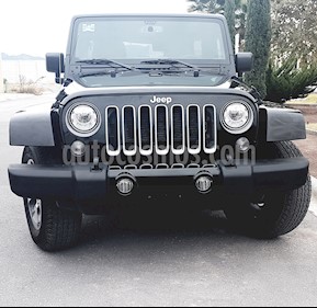 foto Jeep Wrangler Unlimited Sahara 4x4 3.6L Aut usado (2018) color Negro precio $639,700