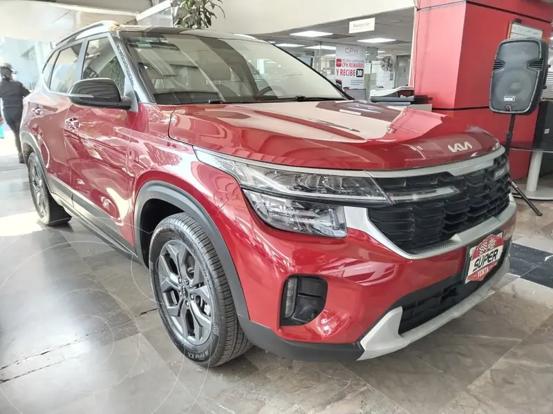 Foto Kia Seltos EX Pack usado (2024) color Rojo financiado en mensualidades(enganche $187,682 mensualidades desde $7,897)