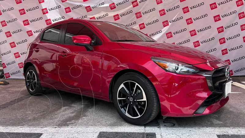 Foto Mazda 2 Sedan i Grand Touring Aut usado (2024) color Rojo financiado en mensualidades(enganche $129,580 mensualidades desde $5,567)