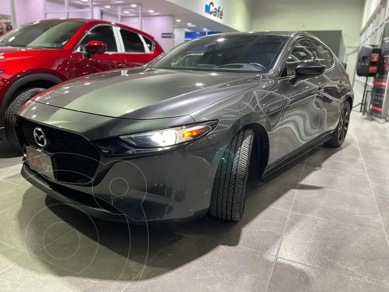 Foto Mazda 3 Hatchback Signature usado (2021) color Gris Oscuro financiado en mensualidades(enganche $123,750 mensualidades desde $7,178)