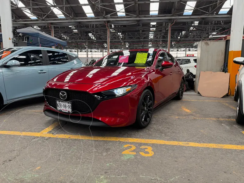 Foto Mazda 3 Sedan i Sport usado (2021) color Rojo financiado en mensualidades(enganche $77,500 mensualidades desde $7,200)