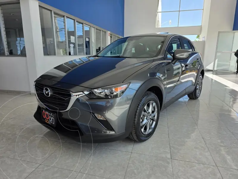 Foto Mazda CX-3 i usado (2024) color Gris financiado en mensualidades(enganche $92,596 mensualidades desde $7,081)