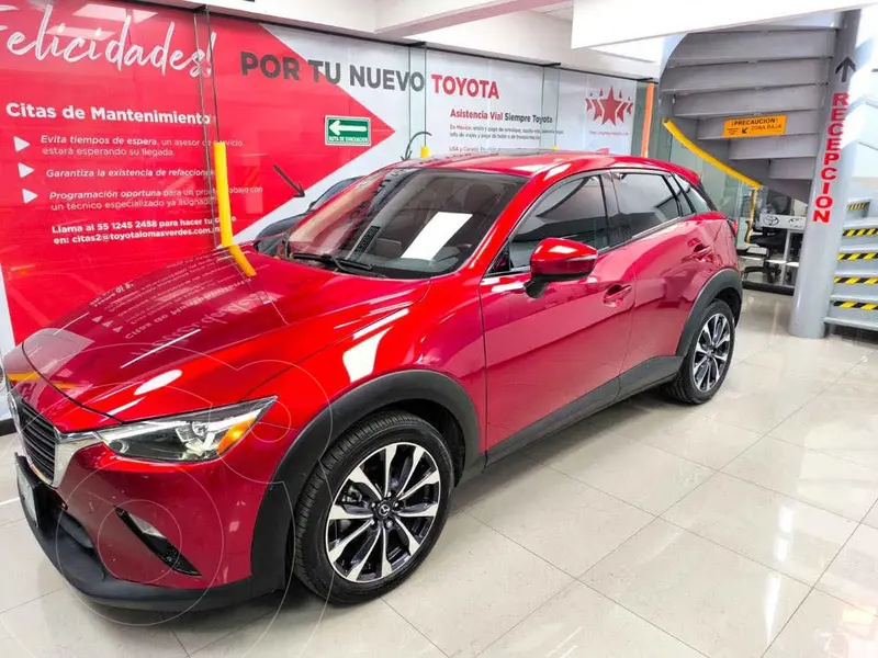 Foto Mazda CX-3 i Sport usado (2023) color Rojo financiado en mensualidades(enganche $81,202 mensualidades desde $8,010)