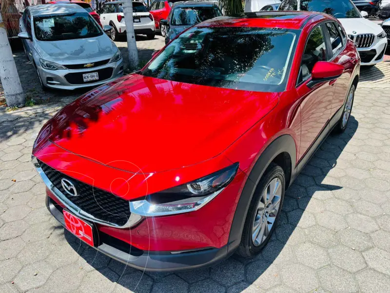 Foto Mazda CX-30 i Sport MHEV usado (2023) color Rojo financiado en mensualidades(enganche $104,006 mensualidades desde $9,238)