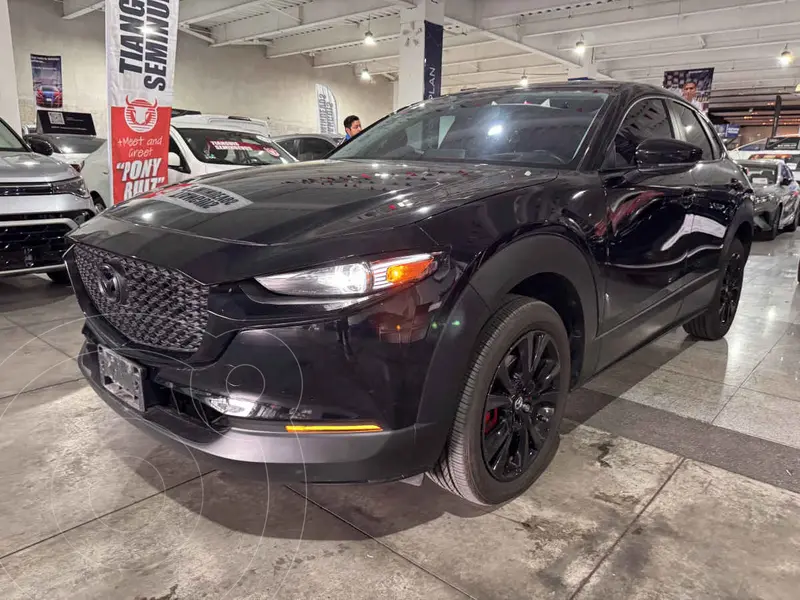 Foto Mazda CX-30 Signature usado (2024) color Negro financiado en mensualidades(enganche $121,262 mensualidades desde $9,277)