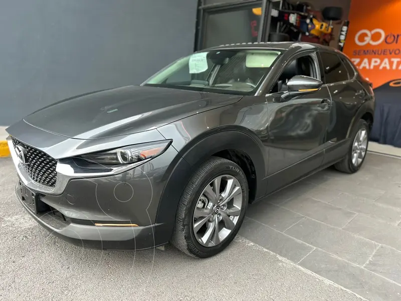 Foto Mazda CX-30 i Grand Touring usado (2022) color Gris financiado en mensualidades(enganche $108,728 mensualidades desde $8,314)