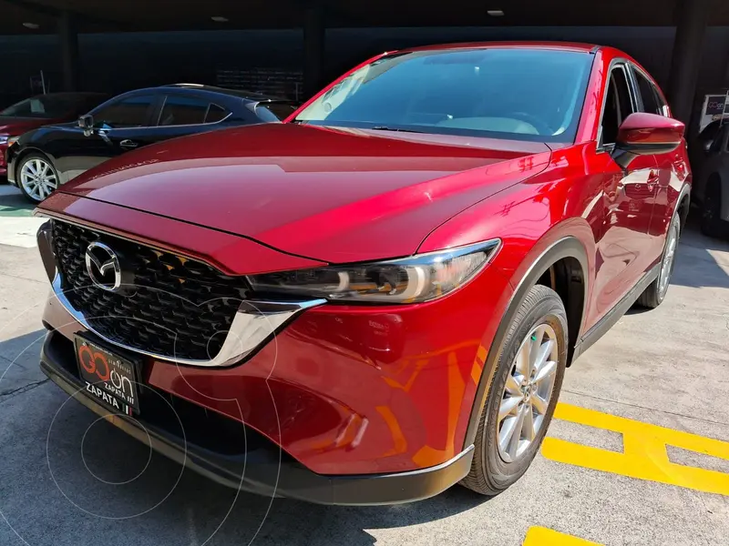 Foto Mazda CX-5 i Sport usado (2022) color Rojo financiado en mensualidades(enganche $114,450 mensualidades desde $8,752)