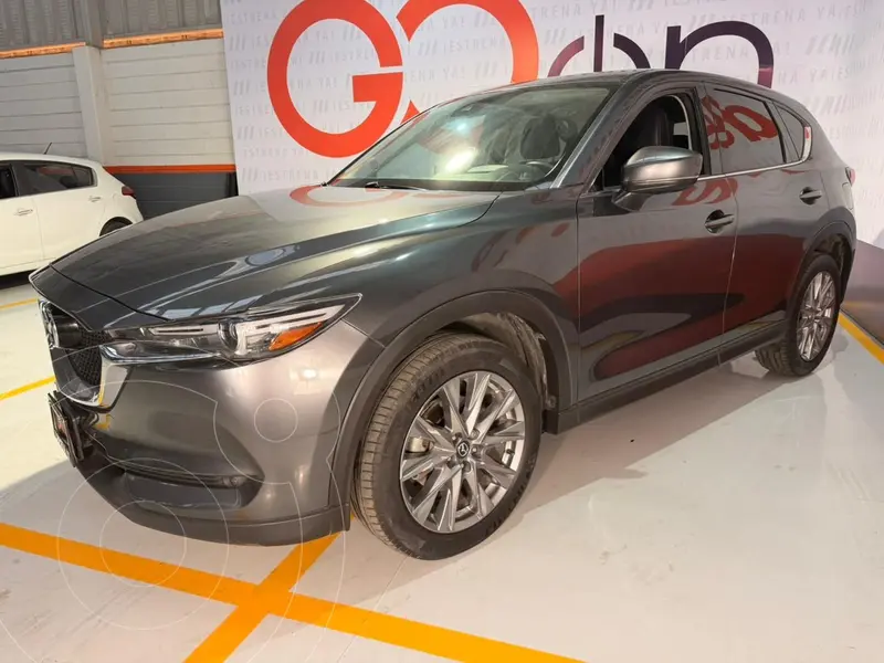 Foto Mazda CX-5 Signature usado (2021) color Gris financiado en mensualidades(enganche $108,728 mensualidades desde $8,314)