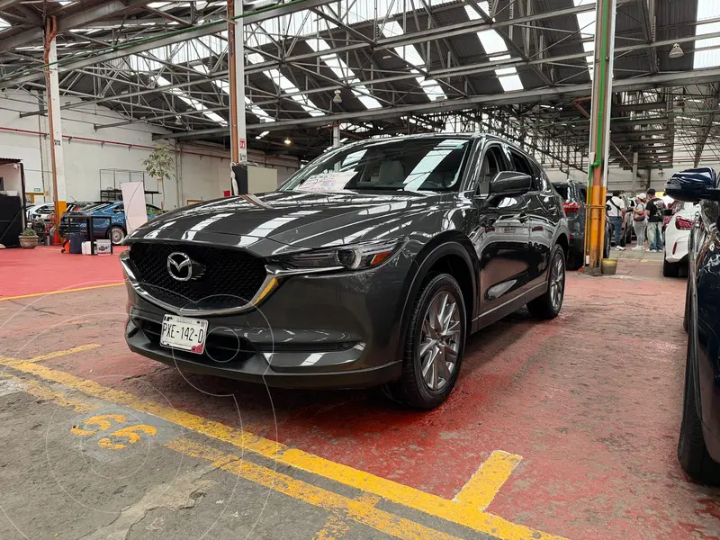 Foto Mazda CX-5 Signature usado (2021) color Gris Titanio financiado en mensualidades(enganche $99,500 mensualidades desde $9,000)
