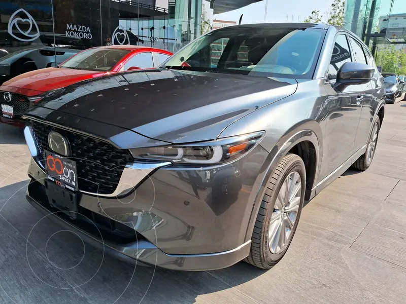 Foto Mazda CX-5 Signature usado (2025) color Gris financiado en mensualidades(enganche $162,138 mensualidades desde $12,399)
