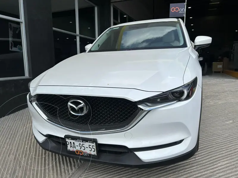 Foto Mazda CX-5 Signature usado (2021) color Blanco financiado en mensualidades(enganche $122,625 mensualidades desde $9,377)