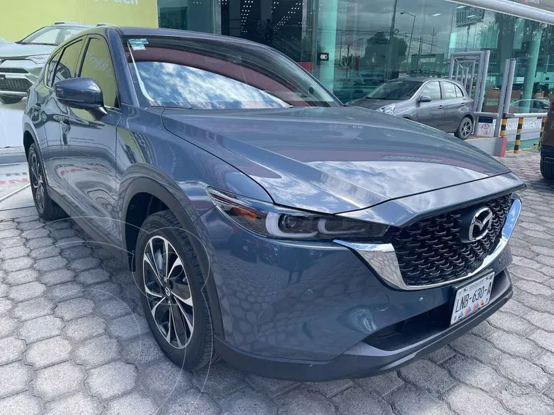 Foto Mazda CX-5 Signature usado (2023) color Gris financiado en mensualidades(enganche $137,062 mensualidades desde $11,573)