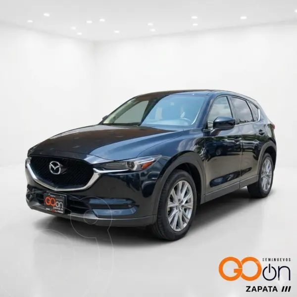Foto Mazda CX-5 i Grand Touring usado (2021) color MAZWNEGRO CELESTE precio $399,000