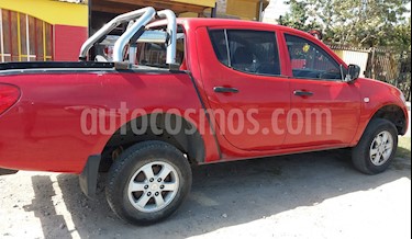 foto Mitsubishi L-200 2.5 Work CRM Diésel 4X2 usado (2013) color Rojo precio $7.500.000