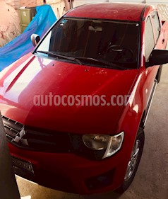 Mitsubishi L200 4x2 2.4L Cabina Doble usado (2011) color Rojo precio $160,000