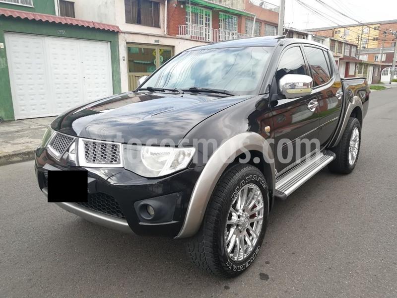 Mitsubishi L200 4x4 3.2 CR CD Aut usado (2010) color Negro precio $1.000.000