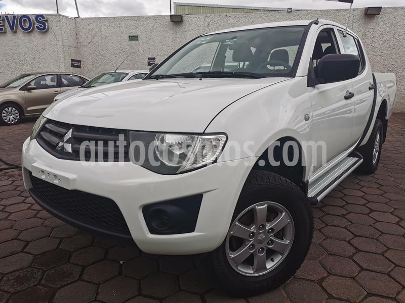 Foto Mitsubishi L200 4x2 2.4L Cabina Doble usado (2015) color Blanco precio $250,000