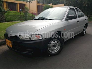 Foto venta Carro Usado Mitsubishi Lancer 1.3L (1998) color Acero precio $9.900.000