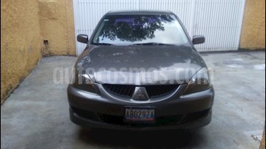Foto venta carro usado Mitsubishi Lancer Touring Sinc. (2010) color Gris precio u$s4.700