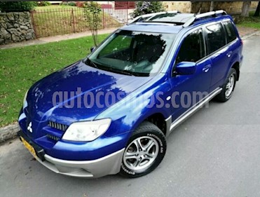 Foto venta Carro usado Mitsubishi Outlander 2.4L 4x4 (2007) color Azul Cosmico precio $31.500.000