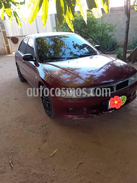 Mitsubishi Signo Plus 1.3L usado (2016) color Rojo Noble precio u$s1.050