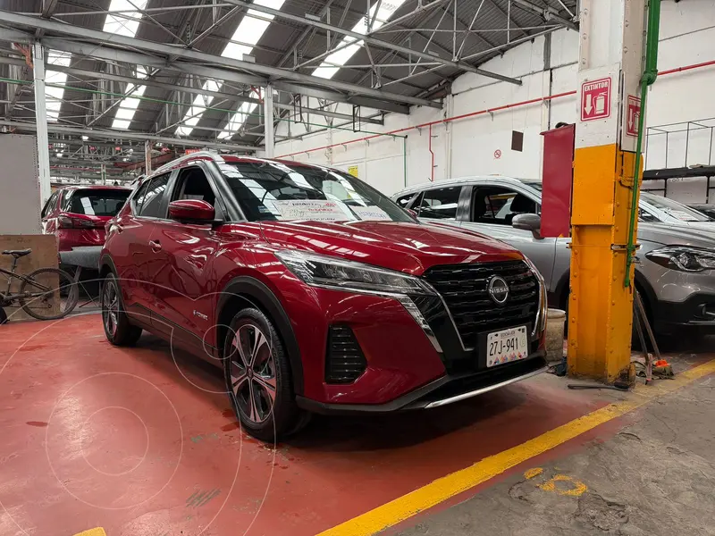 Foto Nissan Kicks E-Power Advance usado (2023) color Rojo Alfa financiado en mensualidades(enganche $84,600 mensualidades desde $7,700)