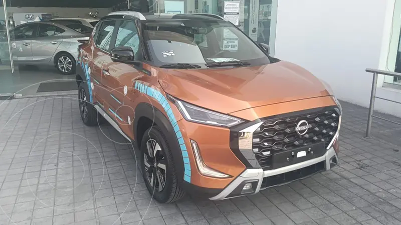 Foto Nissan Magnite Exclusive usado (2025) color Naranja financiado en mensualidades(enganche $151,692 mensualidades desde $6,382)