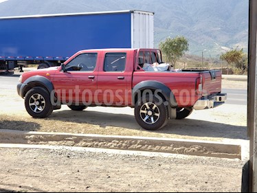 foto Nissan Terrano DX 2.5L TDi CD 4x4 Ac usado (2011) color Rojo precio $7.200.000