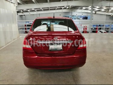 foto Nissan Tiida Sedan 4P SENSE TM6 A/AC. CD R-15 usado (2014) color Rojo precio $115,000
