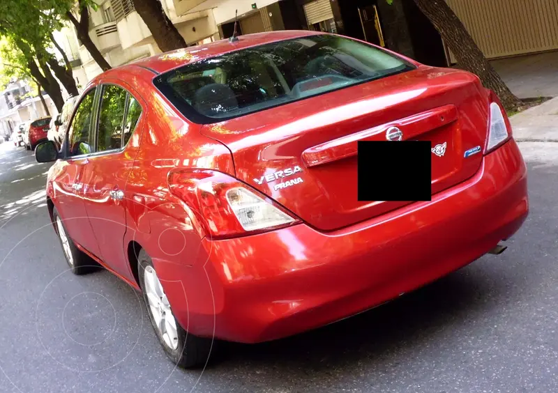 Foto Nissan Versa Acenta usado (2014) color Rojo precio u$s7.500