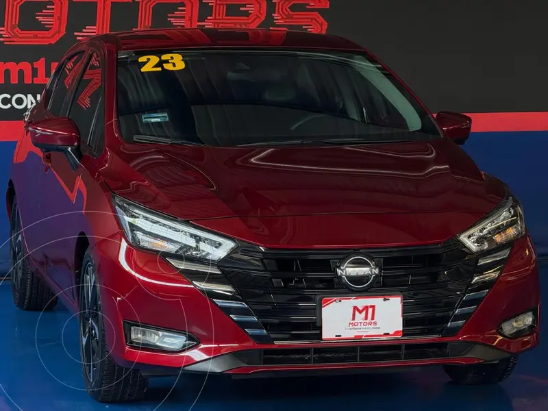Foto Nissan Versa Exclusive Aut usado (2023) color Rojo Scarlet financiado en mensualidades(enganche $67,000)