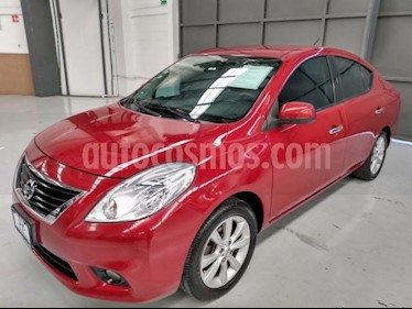 foto Nissan Versa 4P EXCLUSIVE L4/1.6 AUT usado (2014) color Rojo precio $135,000