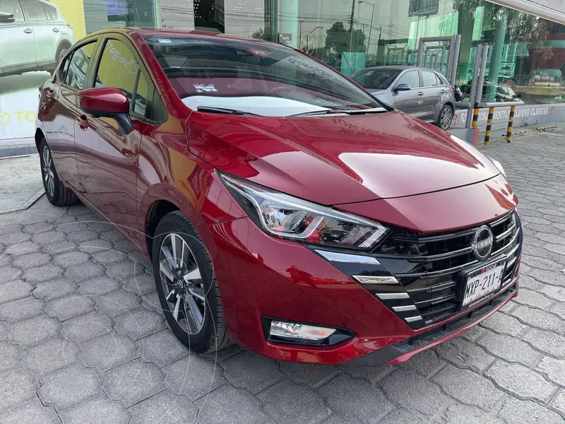 Foto Nissan Versa Advance Aut usado (2024) color Rojo financiado en mensualidades(enganche $91,375 mensualidades desde $7,715)