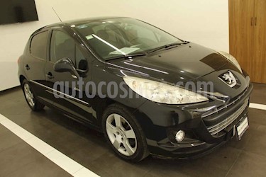 Peugeot 207 5p Feline L4 1.6L 5vel usado (2013) color Negro precio $138,000