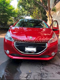 foto Peugeot 208 1.6L Féline NAV Aut usado (2014) color Rojo Rubí precio $140,000