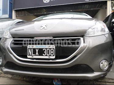 Foto Peugeot 208 Active 1.5 usado (2014) color Gris Oscuro precio $250.000