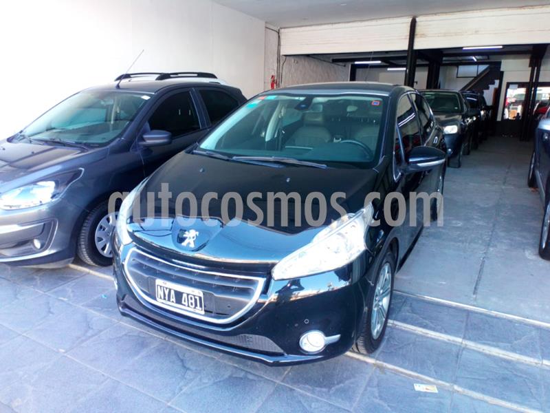 foto Peugeot 208 Feline 1.6 Pack Cuir usado (2014) color Negro precio $590.000
