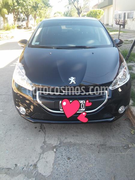 foto Peugeot 208 Allure 1.5 usado (2014) color Negro Perla precio $900.000