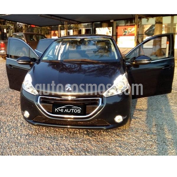 Peugeot 208 Feline 1.6 usado (2016) color Rojo precio $910.000