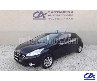 Peugeot 208 Active 1.5 usado (2013) color Negro precio $578.000