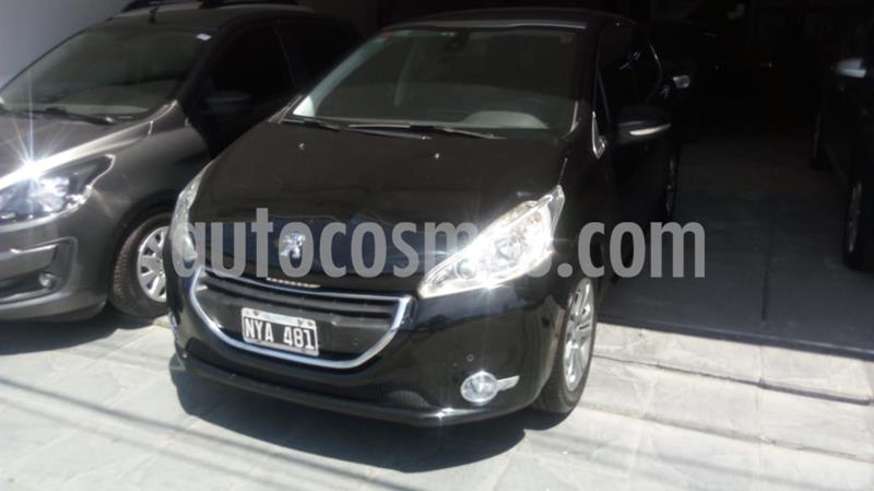 foto Peugeot 208 Feline 1.6 Pack Cuir usado (2014) color Negro precio $1.000.000