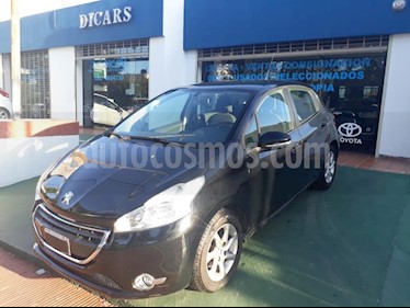 Peugeot 208 Active 1.5 usado (2013) color Negro precio $450.000