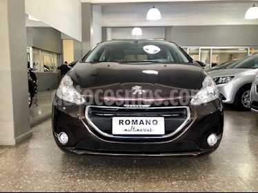 Foto Peugeot 208 Allure 1.5 NAV usado (2014) color Carmin Oscuro precio $500.000