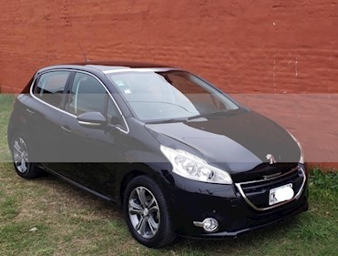 foto Peugeot 208 Feline 1.6 usado (2014) color Negro precio $435.000
