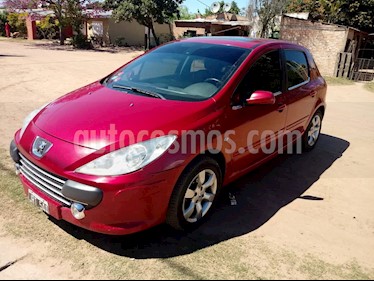 Foto Peugeot 307 5P 1.6 XT Premium usado (2011) color Rojo precio $240.000