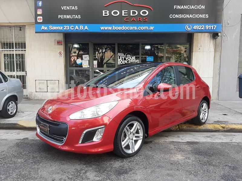 foto Peugeot 308 Feline HDi usado (2013) color Rojo precio $1.100.000