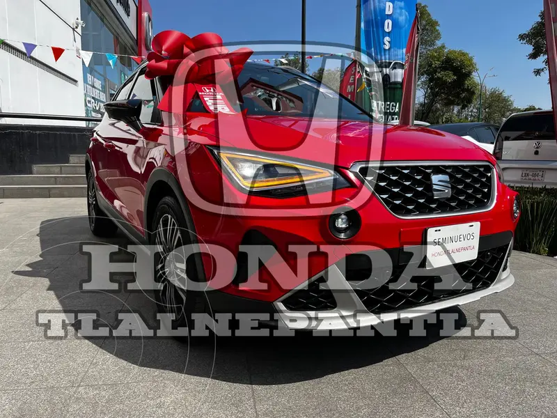 Foto SEAT Arona Xperience usado (2022) color Rojo financiado en mensualidades(enganche $145,046 mensualidades desde $6,103)