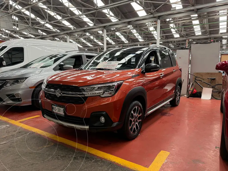 Foto Suzuki Ertiga XL7 GLX Aut usado (2023) color Naranja financiado en mensualidades(enganche $81,500 mensualidades desde $7,400)