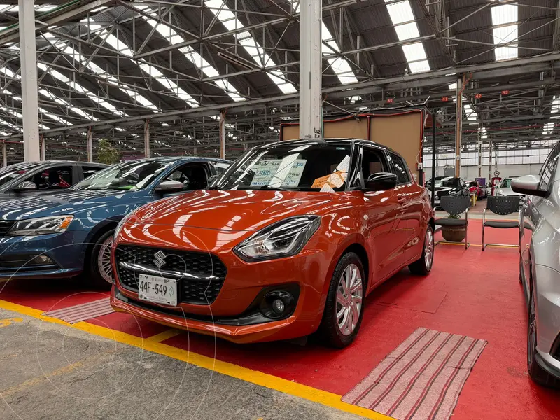 Foto Suzuki Swift Booster Jet usado (2023) color Naranja financiado en mensualidades(enganche $72,000 mensualidades desde $6,600)